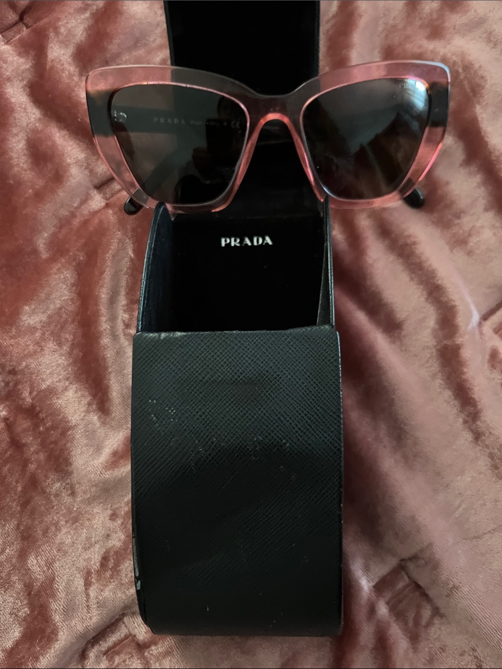 Prada Pink Transparent Cat-Eye Sunglasses with Dark Lenses